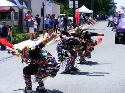 I don't know how these guys dance in those heavy costumes.